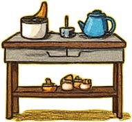 a table with a tea pot and a tea pot on it.jpg